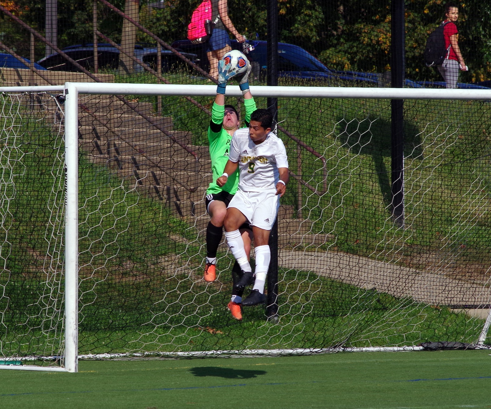Photo (courtesy of Saint Vincent College Sports Information): Penn State Altoona sophomore goalkeeper Tanner Yaw goes up to grab the ball in front of Saint Vincent College's #9 Ian Garay during Wednesday afternoon's game.