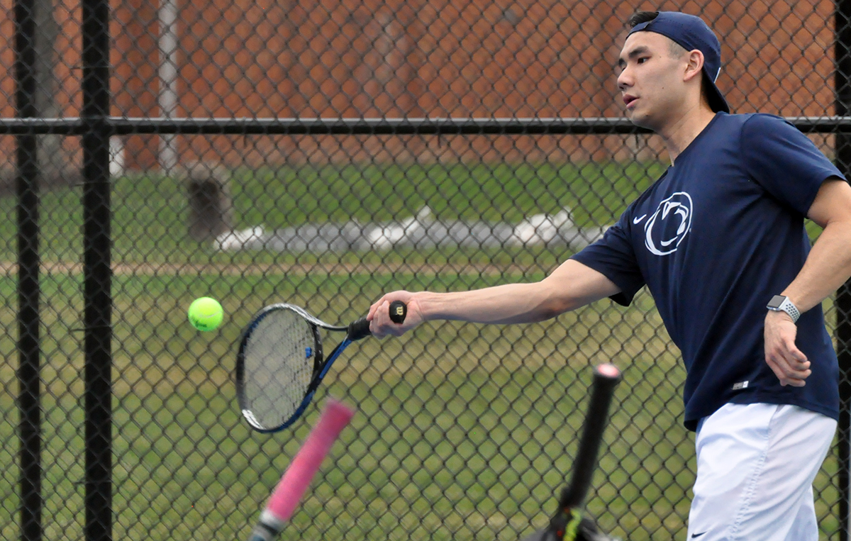 Photo (by Cory Maines): Penn State Altoona junior Andrew Ung puts a forehand swing on the ball during Monday's match against St. Vincent at the Adler Tennis Courts.