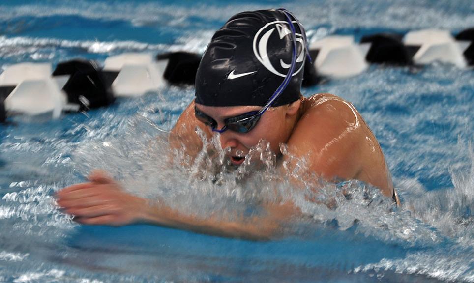 Photo (by Joel Nelson): Penn State Altoona freshman Elizabeth Anderson swims the breaststroke during her team's meet against Penn State Behrend in the Adler Natatorium on Saturday.