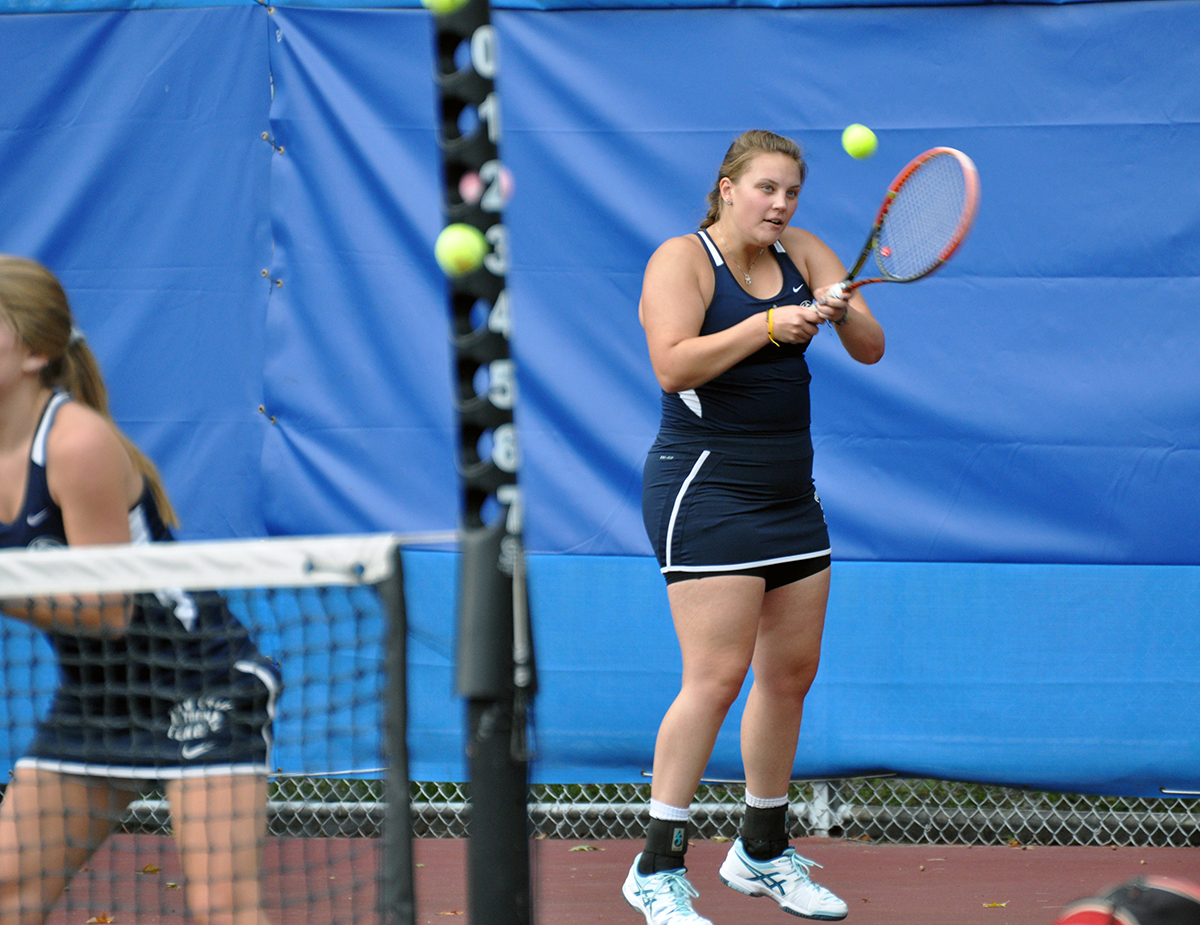 Photo: Penn State Altoona sophomore Brayley Lewis hits a backhand during her doubles match on Friday against Penn State Behrend at Mansion Park.