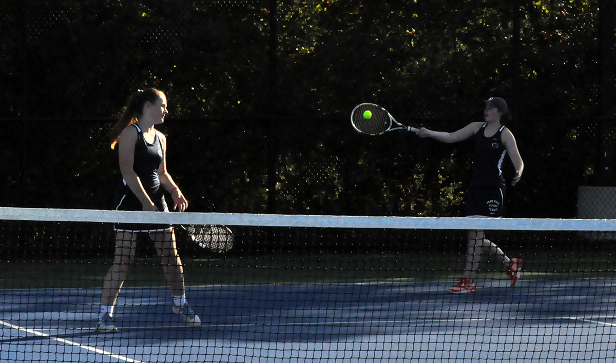Photo (by Omer Sanchez): Katie Kruza (left) and Grace Butz (right) compete in No. 3 doubles on Friday against Penn State Behrend.