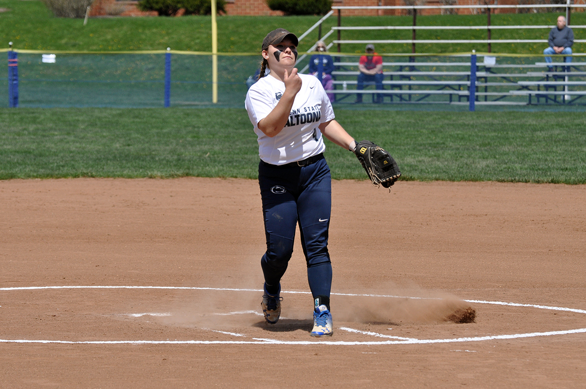 Photo (by Joel Nelson): Penn State Altoona's Emily Strouse follows through on a pitch during Sunday's doubleheader against D'Youville at Stewart Athletic Field.