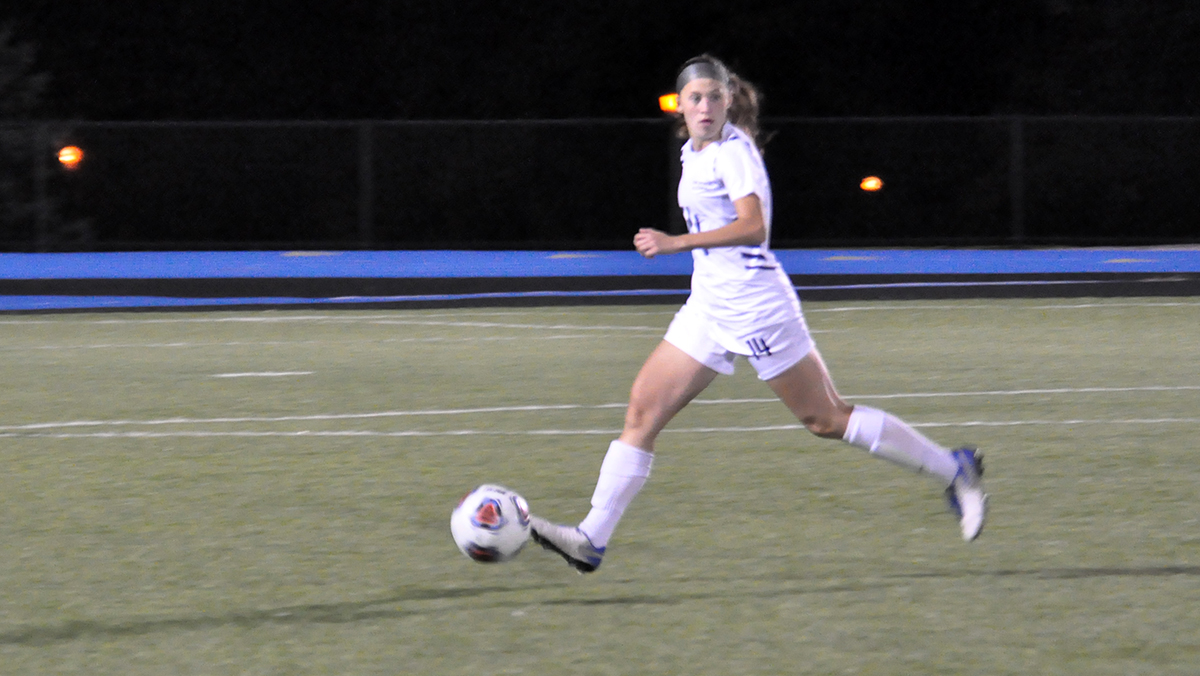 Photo (by Omer Sanchez): Sophomore defender Alana Masullo looks downfield during Wednesday night's game against Pitt-Greensburg.