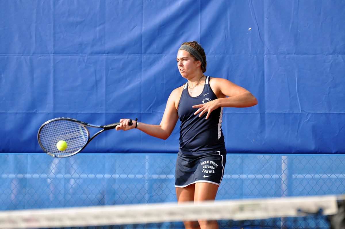 Photo: Penn State Altoona sophomore Kate Hugendubler hits a forehand shot during her singles match against Clarion University on Thursday afternoon at the Leopold Tennis Courts.