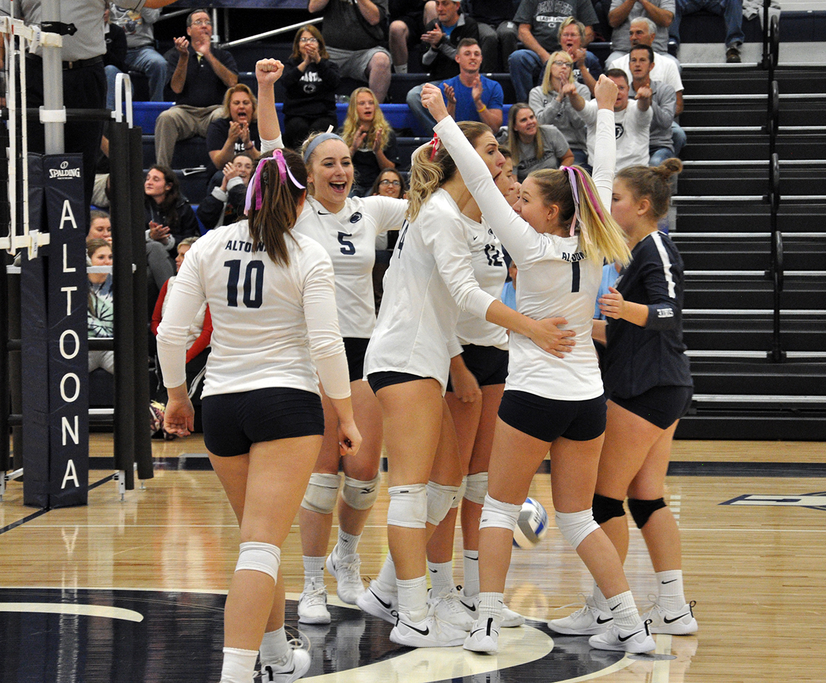 Photo (by Joel Nelson): Women's volleyball celebrates a point during the fifth set of Tuesday's win over Franciscan in the Adler Arena.