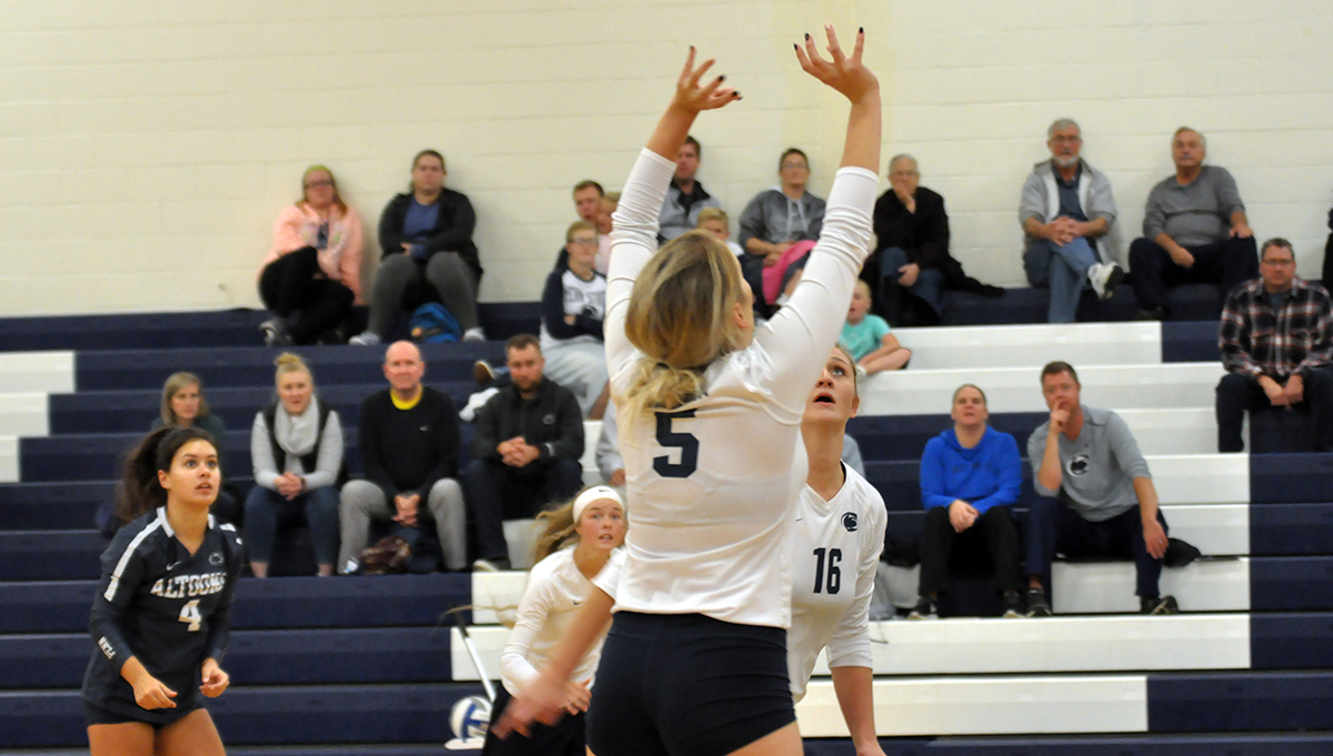 Photo (by Taylor Peterson): Senior Emily Bryan puts up a set during Thursday night's match against Lycoming in the Adler Gym.