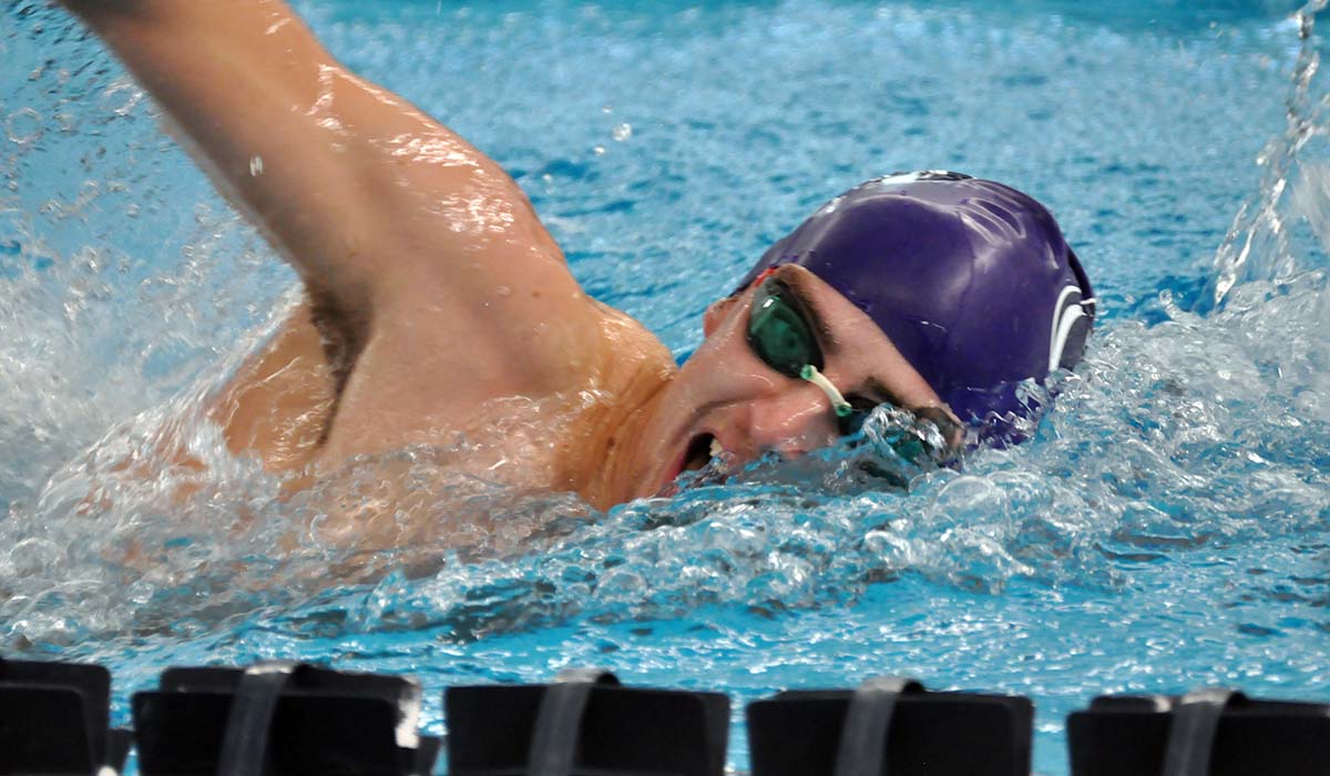 Photo: Luke Pletz competes in the 200 Yard Freestyle, which he won during Saturday's meet against Wells.