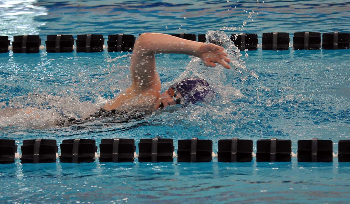Photo: Grace Dangelo swims in the 1,650 Freestyle, during which she set a new team record on Saturday.