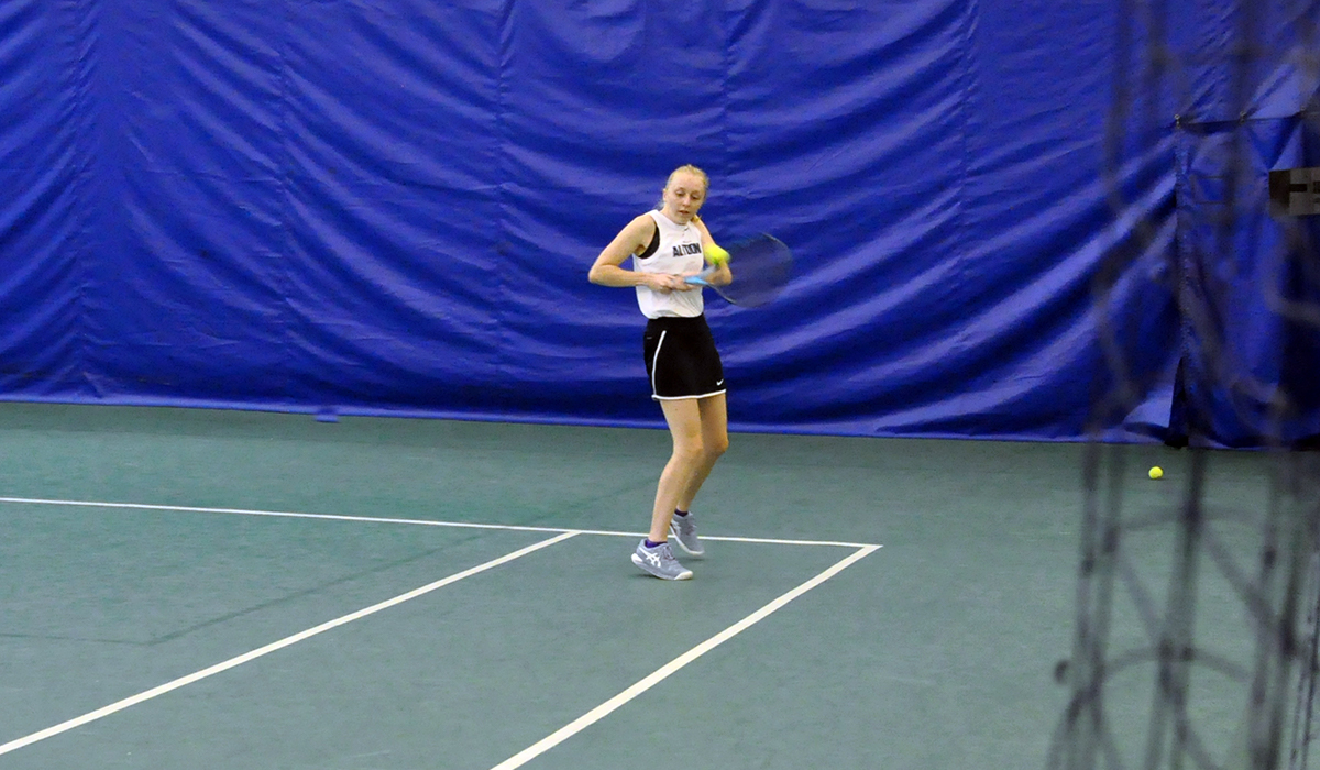 Photo: Jenna Bartlett goes to the backhand during the Lions' match against St. Vincent on Wednesday.